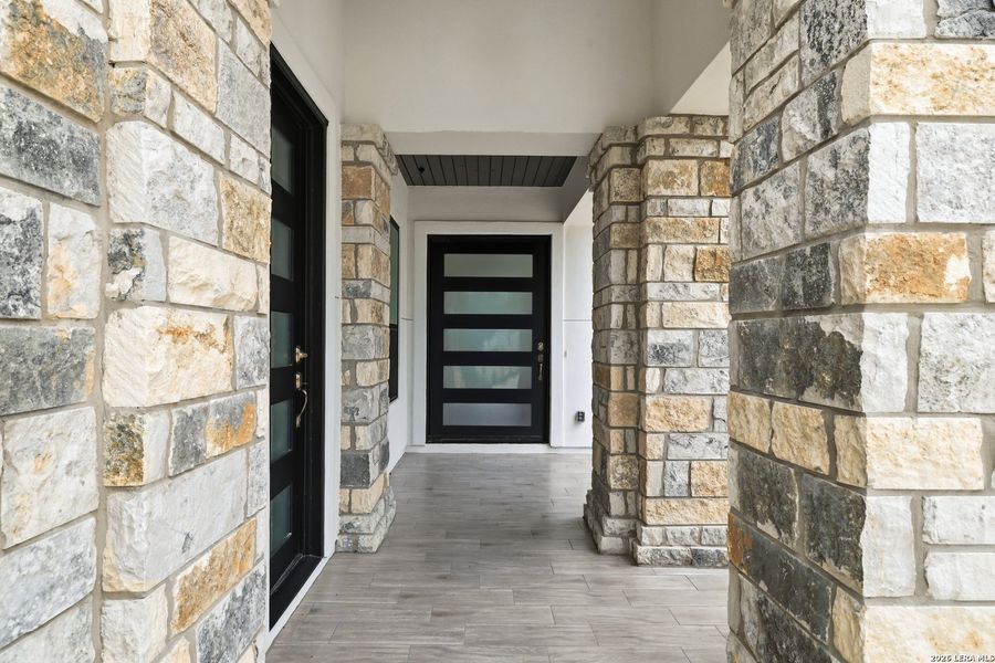 Exterior details and patio area of a home in , New Braunfels (Image 54).