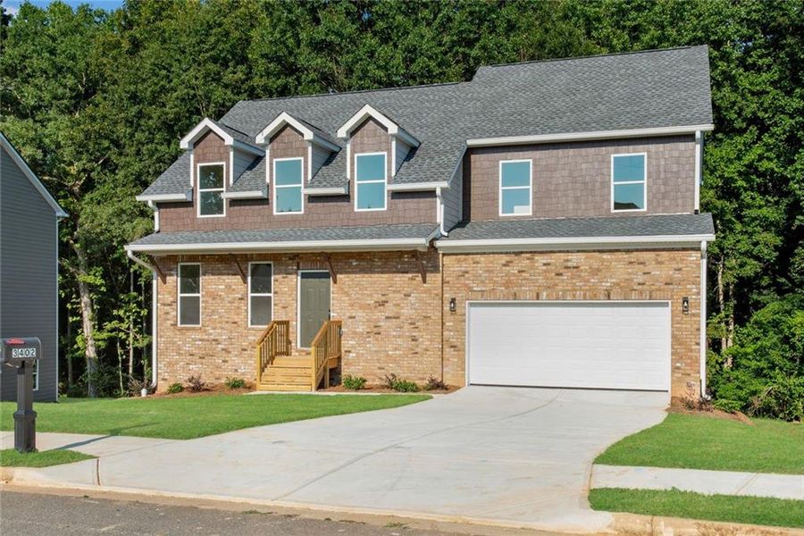Front exterior of a new home in , Ellenwood, GA, highlighting curb appeal (Image 20).