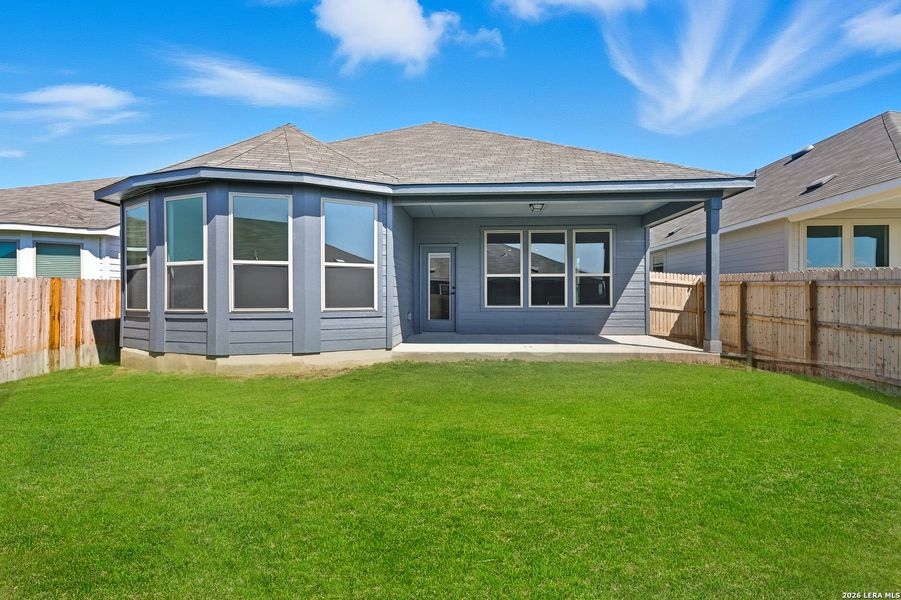 Exterior details and patio area of a home in Bison Ridge, San Antonio (Image 3).
