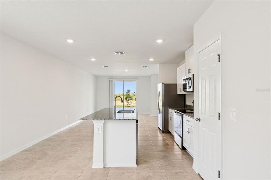 Furnished interior view inside a new home in Springs at Lake Alfred - Classic Series, Lake Alfred (Image 9).
