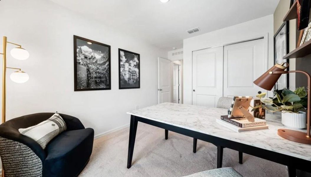 Furnished interior view inside a new home in The Townhomes at Azario Lakewood Ranch, Bradenton (Image 13).
