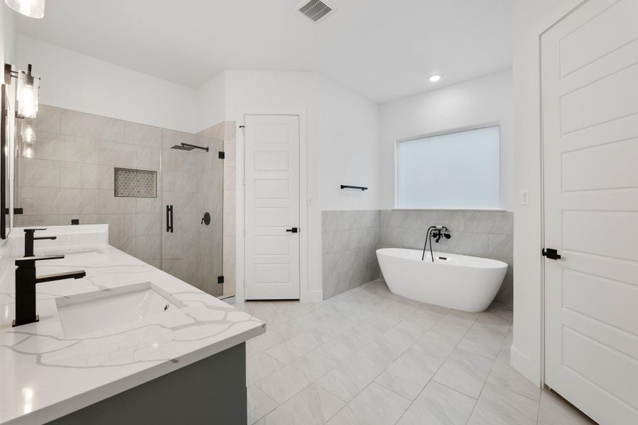 Crisp & Clean Master Bathroom w/ His & Her Closets, Double Sinks, Soaking Tub, & Stand-up Shower Crisp & Clean Master Bathroom w/ His & Her Closets, Double Sinks, Soaking Tub, & Stand-up Shower