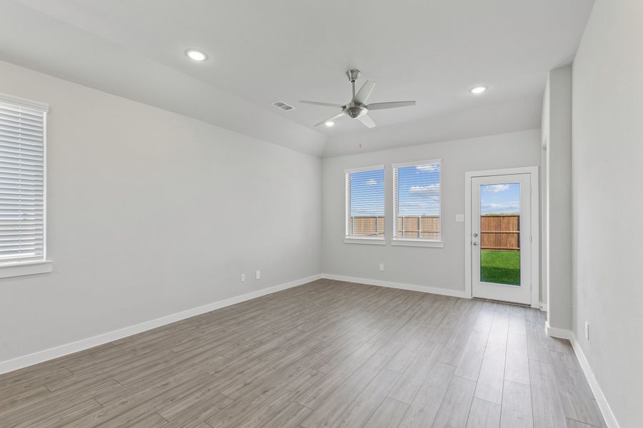 Living room in in the Elm home plan by Trophy Signature Homes – REPRESENTATIVE PHOTO