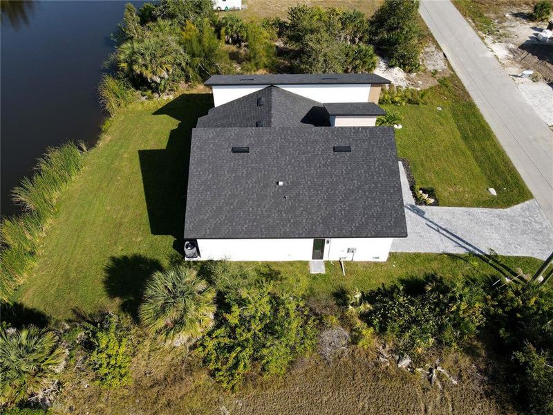Front exterior of a new home in , Port Charlotte, FL, highlighting curb appeal (Image 24). Front exterior of a new home in , Port Charlotte, FL, highlighting curb appeal (Image 24).