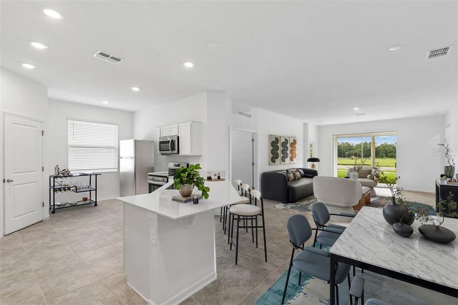 Furnished interior view inside a new home in Peace Creek Reserve, Winter Haven (Image 5).