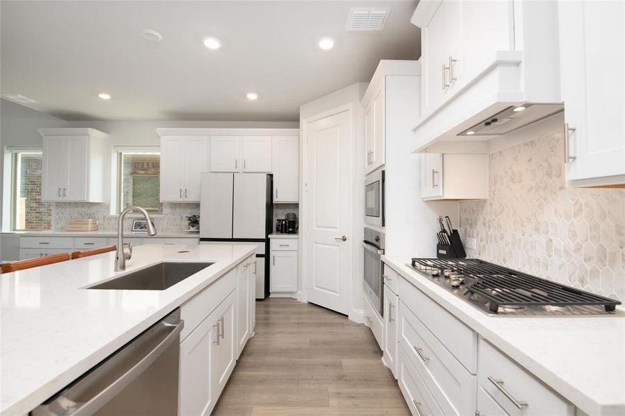 Thoughtful design and premium finishes come together with upgraded cabinetry, quartz countertops, and an open-concept layout that keeps everyone connected. Thoughtful design and premium finishes come together with upgraded cabinetry, quartz countertops, and an open-concept layout that keeps everyone connected.