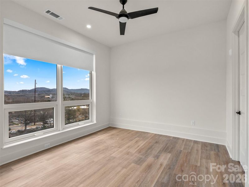 Spacious, unfurnished interior of a new home in , Asheville (Image 24).