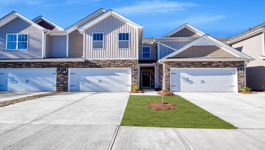 Front exterior of a new home in Skybrook Corners, Huntersville, NC, highlighting curb appeal (Image 1). Front exterior of a new home in Skybrook Corners, Huntersville, NC, highlighting curb appeal (Image 1).