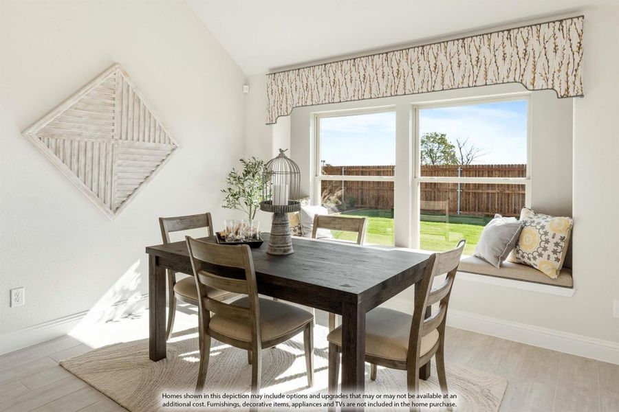Dining area with dark wood table, four chairs, window seat, and large windows overlooking a fenced backyard