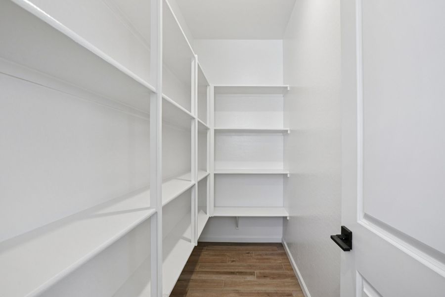 Walk in pantry - Sanctuary at Stonebridge Model Home. Finishes and options may vary by community Walk in pantry - Sanctuary at Stonebridge Model Home. Finishes and options may vary by community
