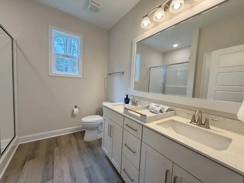 Furnished interior view inside a new home in Parkwood Estates, Leland (Image 10).