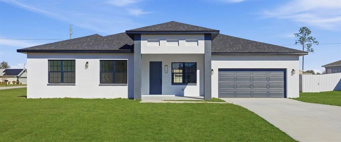 Front exterior of a new home in , Ocala, FL, highlighting curb appeal (Image 24). Front exterior of a new home in , Ocala, FL, highlighting curb appeal (Image 24).