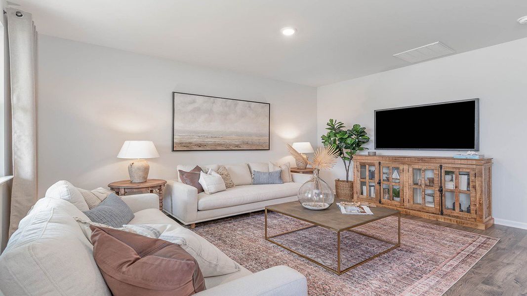 Representative furnished interior of a home built from the ARIA by D.R. Horton in Harper Meadows, Loris (Image 17).