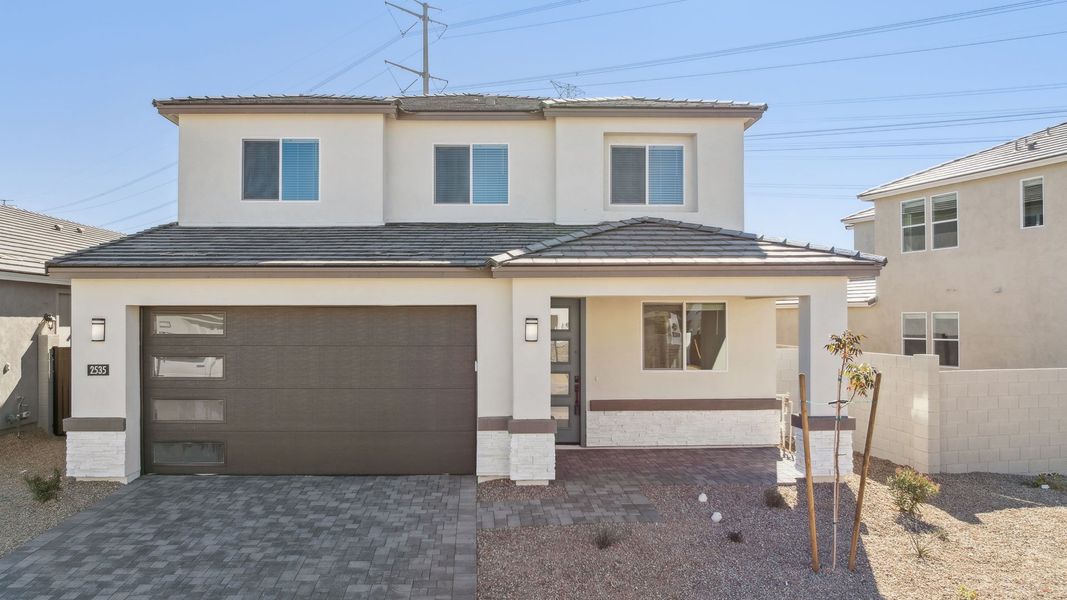 Representative exterior photo of a completed home built from the Crow by D.R. Horton in The Ridge at Stone Butte, Phoenix, AZ (Image 25).