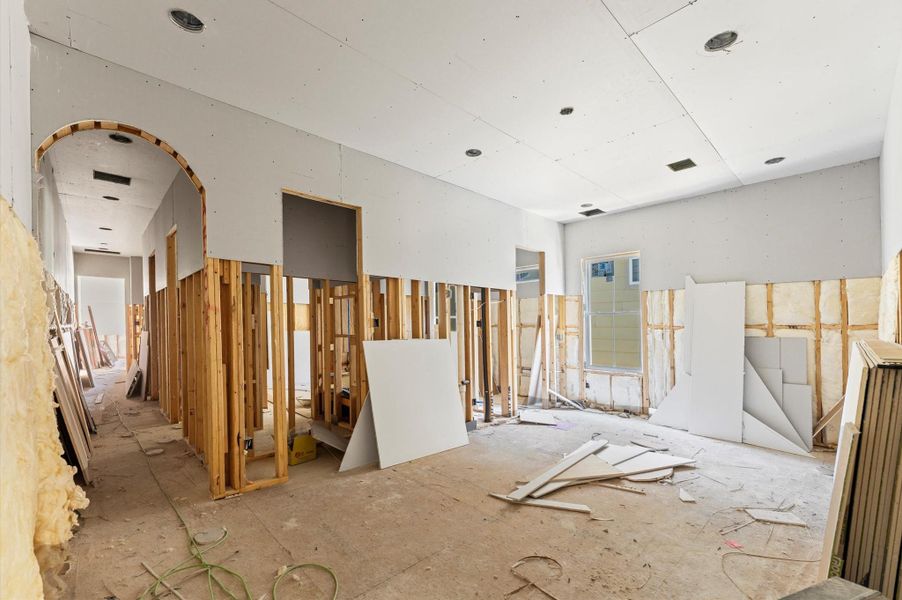 Beautiful arched doorway leads to the second floor bedrooms.