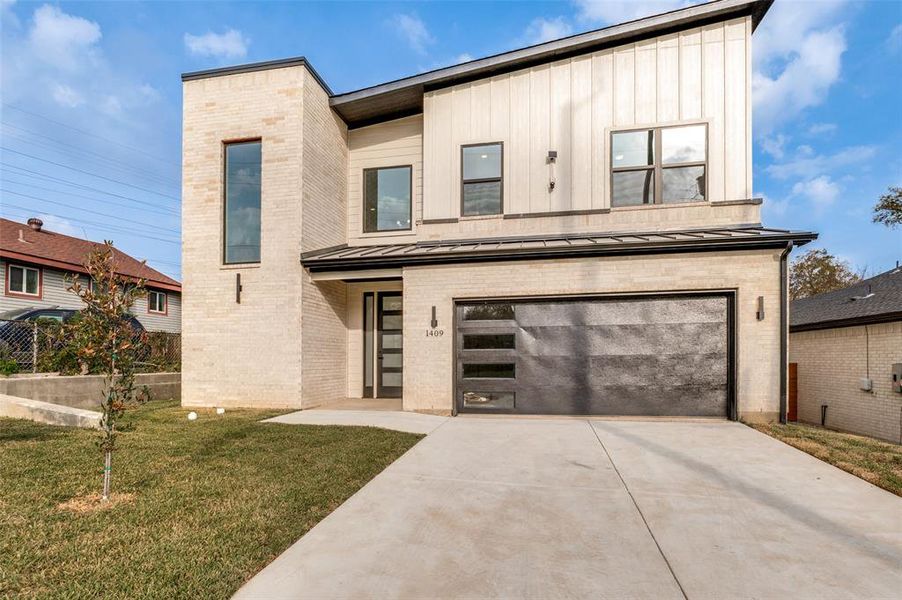 Front exterior of a new home in , Dallas, TX, highlighting curb appeal (Image 24).
