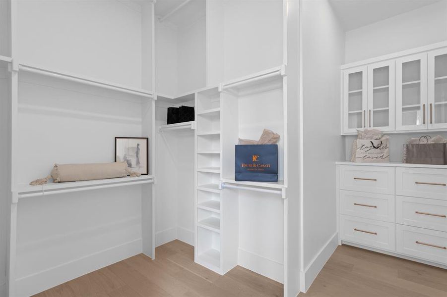 Beautiful walk-in closet with flor to ceiling hanging space! Beautiful walk-in closet with flor to ceiling hanging space!