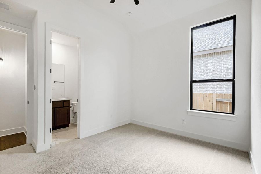 Spacious, unfurnished interior of a new home in 6 Creeks at Waterridge, Kyle (Image 27).