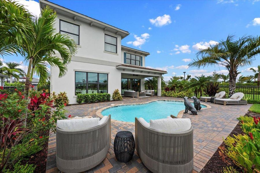 Exterior details and patio area of a home in Apex at Avenir, Palm Beach Gardens (Image 3).