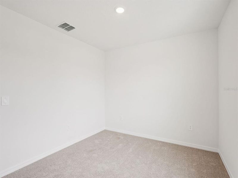 Spacious, unfurnished interior of a new home in Magnolia Bay - Classic Series, Nokomis (Image 8).