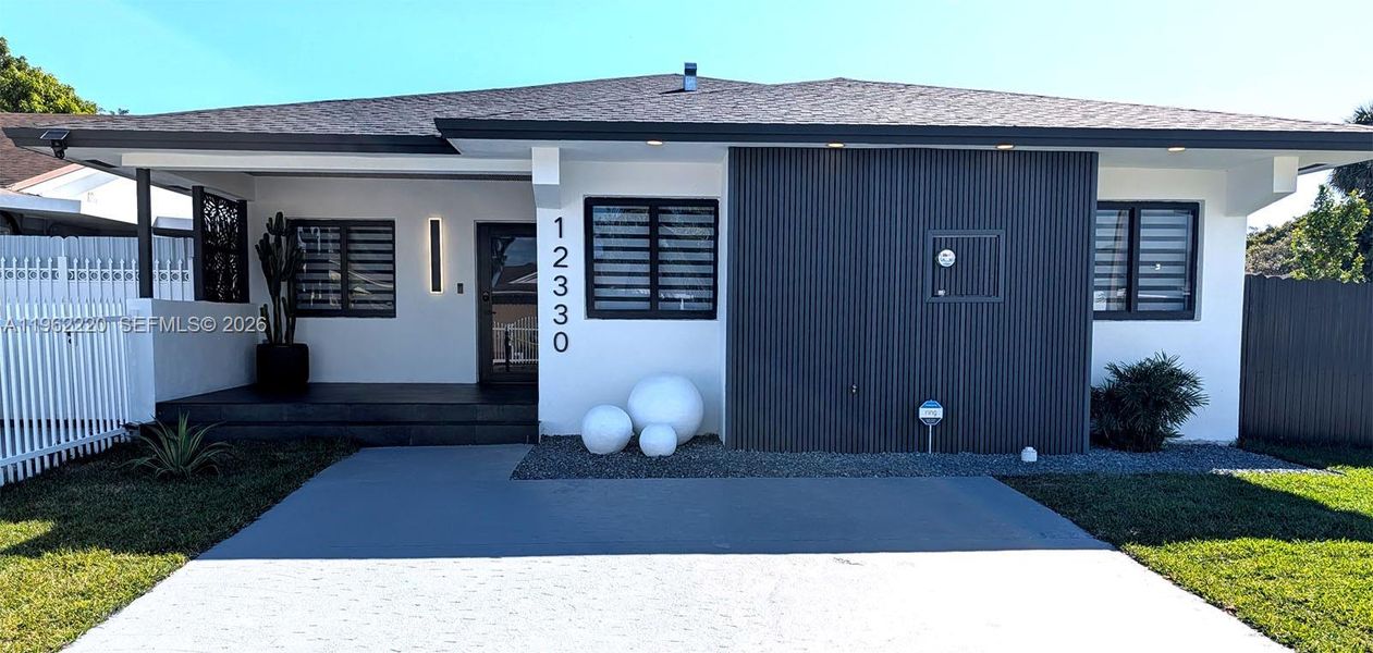 Exterior details and patio area of a home in , Miami (Image 2). Exterior details and patio area of a home in , Miami (Image 2).
