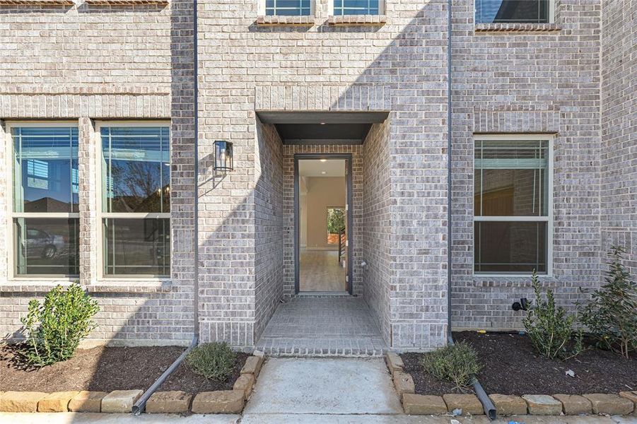 Exterior details and patio area of a home in Ridgepoint, Midlothian (Image 3). Exterior details and patio area of a home in Ridgepoint, Midlothian (Image 3).