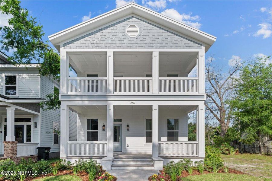 Front exterior of a new home in , Jacksonville, FL, highlighting curb appeal (Image 1).