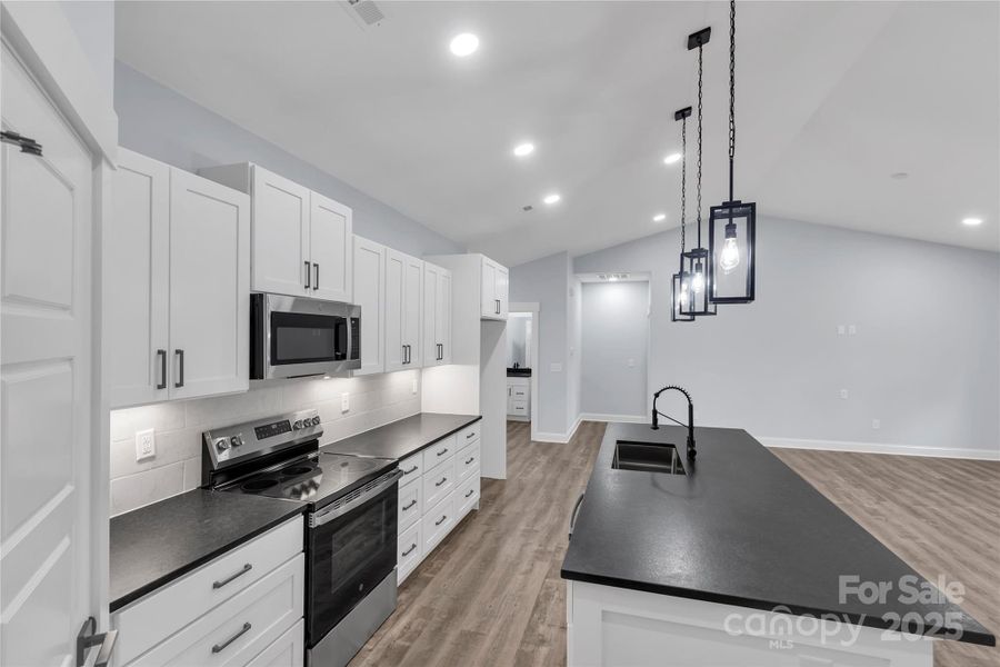 Furnished interior view inside a new home in , Vale (Image 10). Furnished interior view inside a new home in , Vale (Image 10).