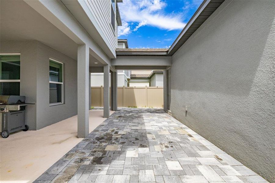 Exterior details and patio area of a home in Highland Ridge, Winter Garden (Image 32).