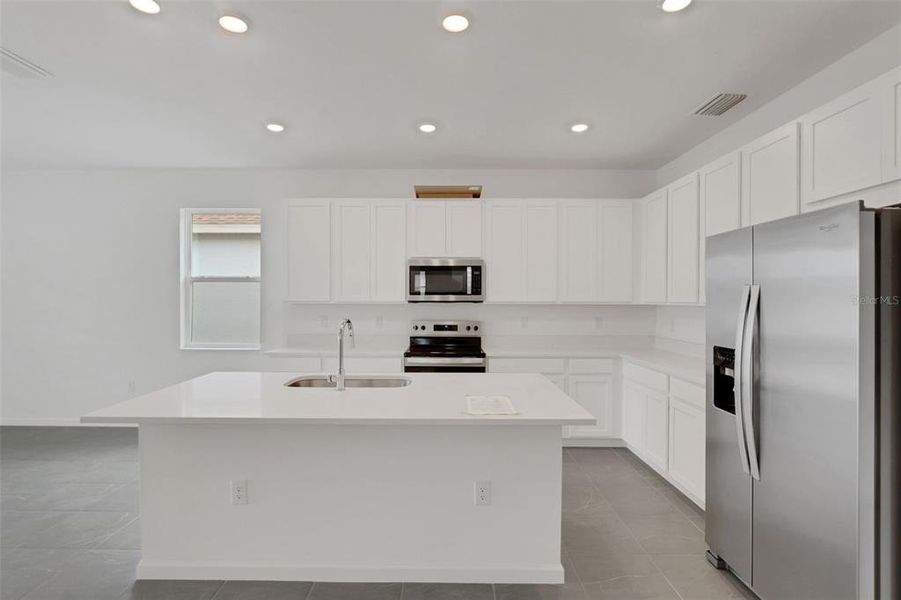 Furnished interior view inside a new home in Cypress Park Estates, Haines City (Image 4).