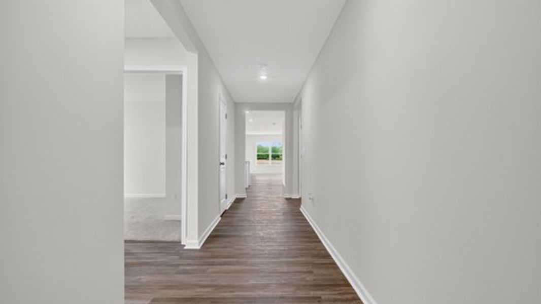 Representative unfurnished interior of a home built from the Cali by D.R. Horton in Mangum Farms, Stem (Image 12).