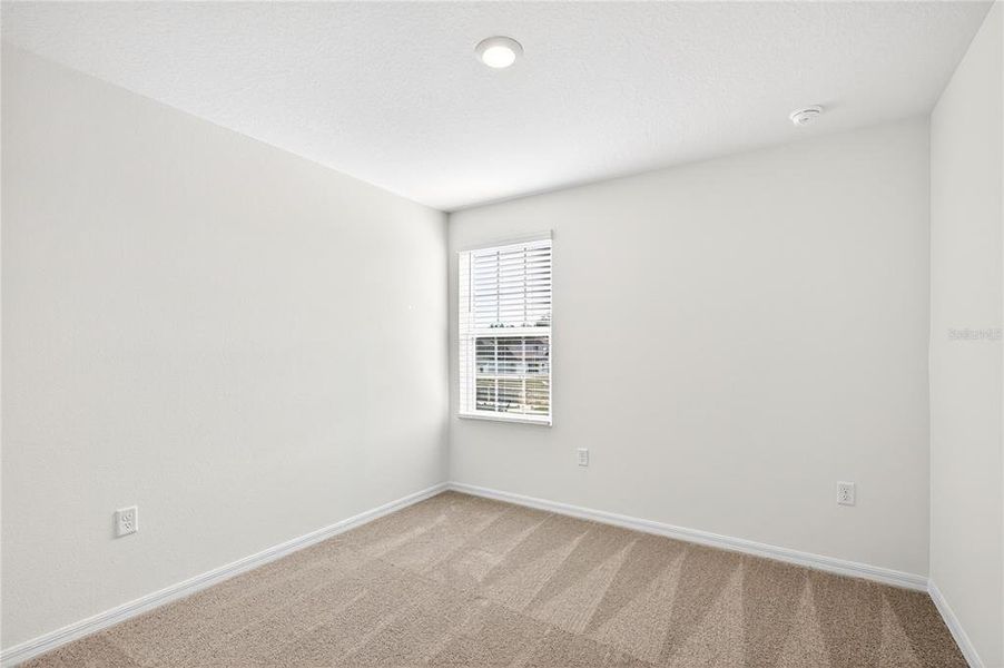 Spacious, unfurnished interior of a new home in Tula Parc, Astatula (Image 30).