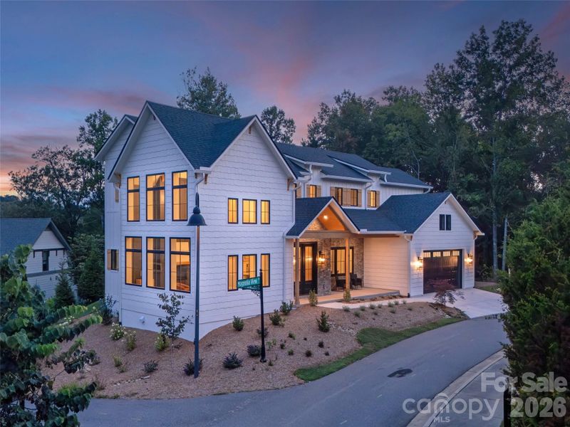 Front exterior of a new home in , Asheville, NC, highlighting curb appeal (Image 28).