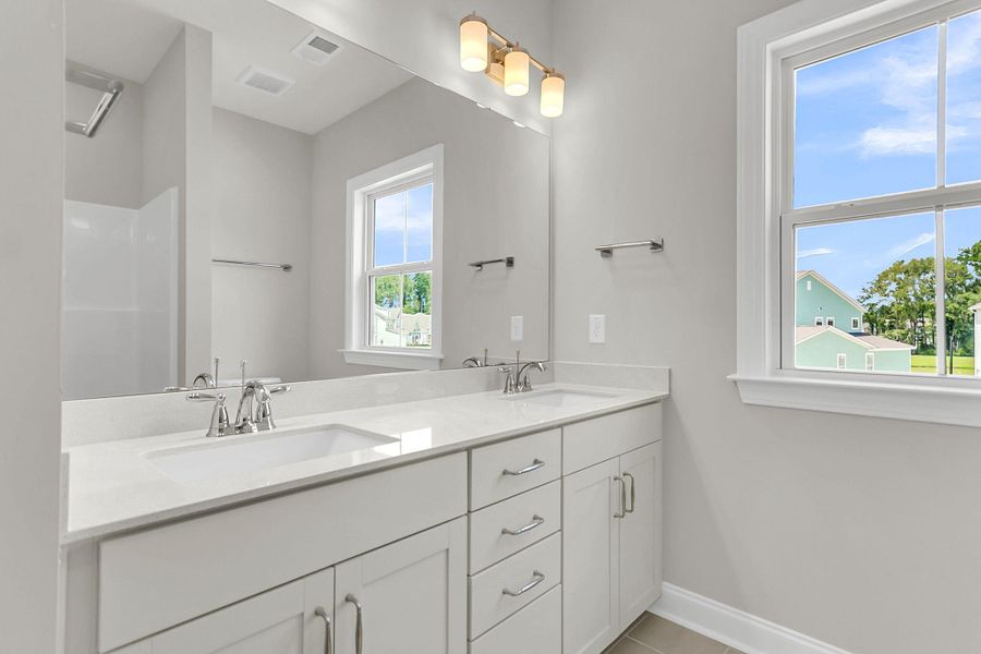 Furnished interior view inside a new home in Tidewater at Lakes of Cane Bay, Summerville (Image 9).