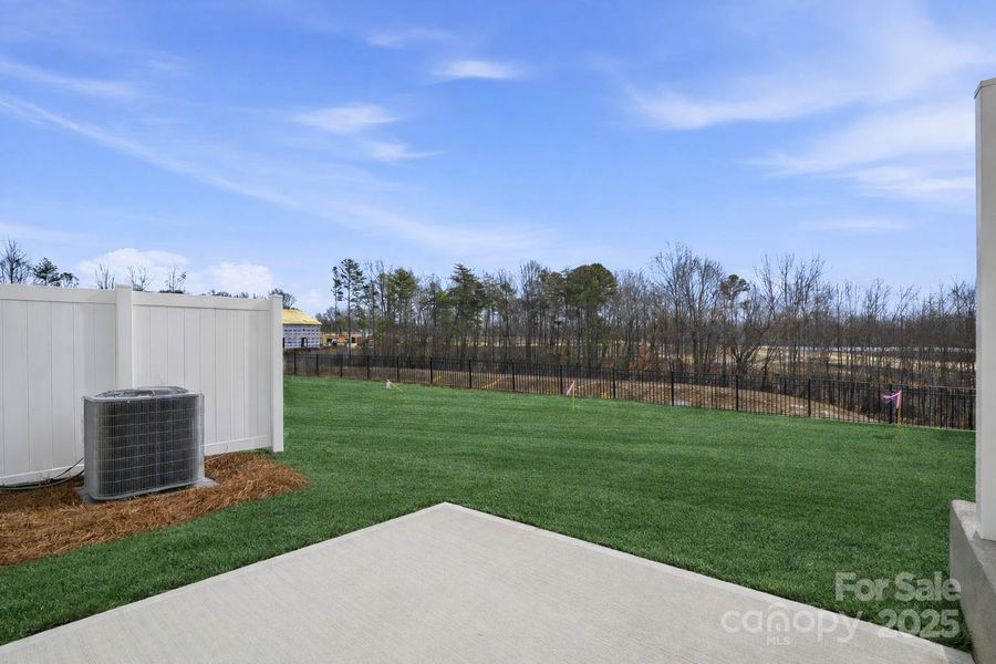 Exterior details and patio area of a home in , Charlotte (Image 2). Exterior details and patio area of a home in , Charlotte (Image 2).