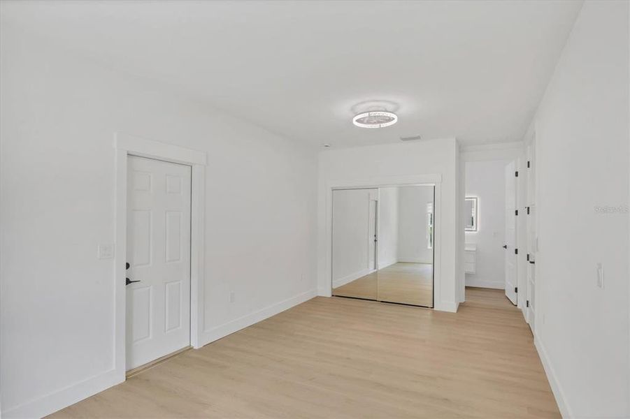 Spacious, unfurnished interior of a new home in , Port Charlotte (Image 34).