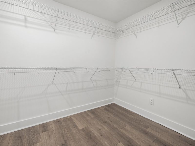 Spacious, unfurnished interior of a new home in The Coves at Lakes of Cane Bay II, Summerville (Image 21).