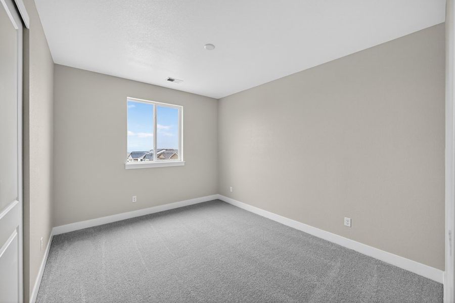 Spacious, unfurnished interior of a new home in Trailstone, Arvada (Image 24).