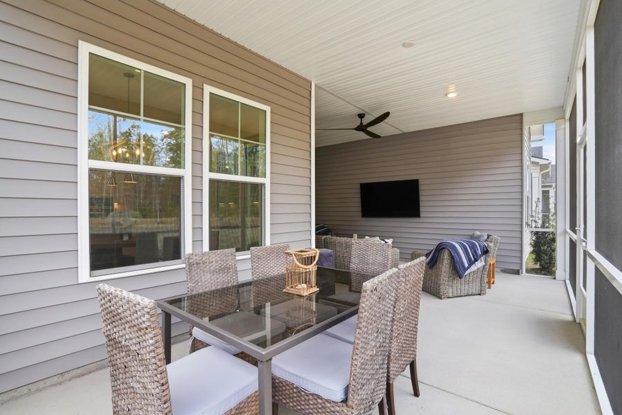 Exterior details and patio area of a home in Summerwind Crossing at Lakes of Cane Bay, Summerville (Image 25).