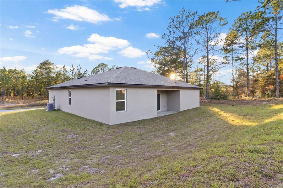 Exterior details and patio area of a home in , Citrus Springs (Image 24).