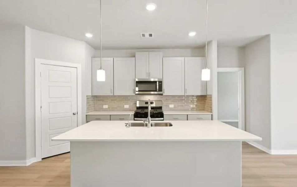 Photo is not of the actual home, but is an inspirational photo of builder’s model home and may depict options, furnishings, and/or decorator features that are not included