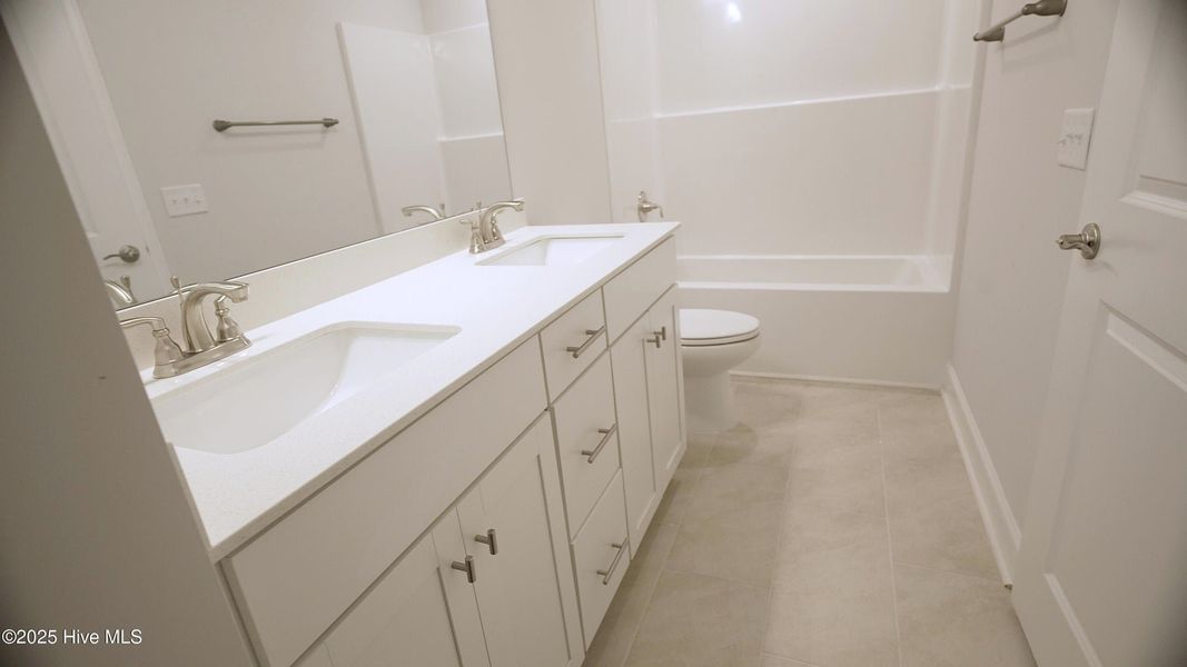 Furnished interior view inside a new home in Palmetto Creek, Bolivia (Image 7).