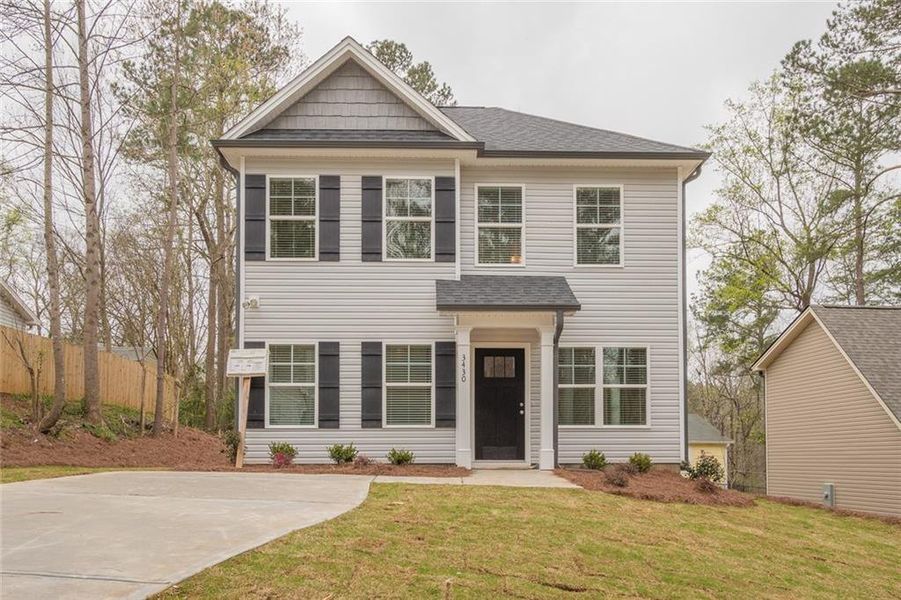 Front exterior of a new home in , Gainesville, GA, highlighting curb appeal (Image 1). Front exterior of a new home in , Gainesville, GA, highlighting curb appeal (Image 1).