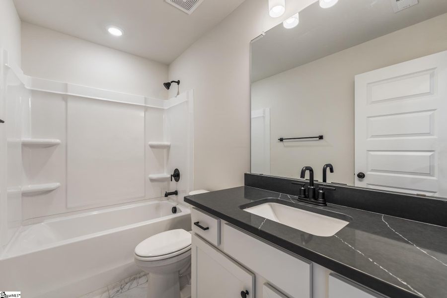 Furnished interior view inside a new home in Renaissance Place, Greenville (Image 7).