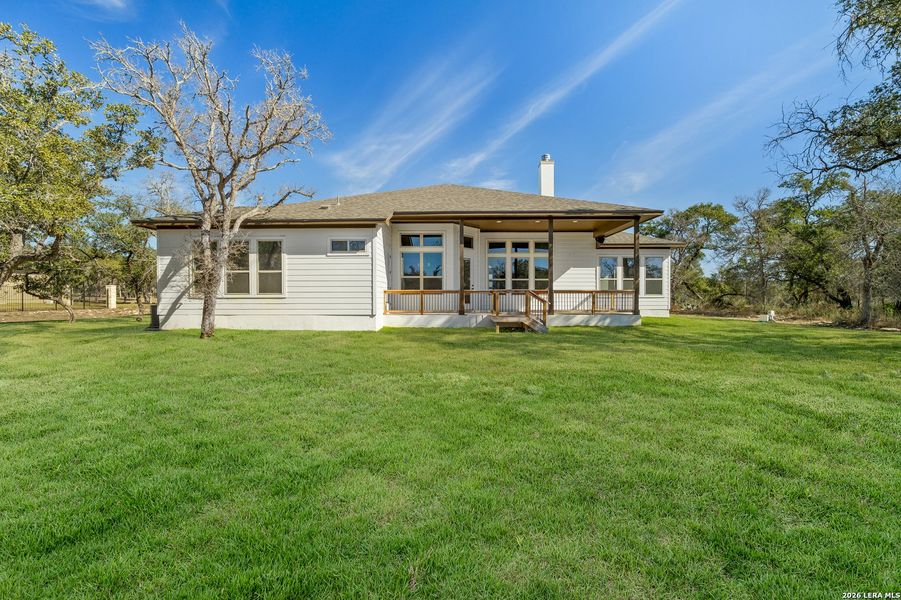 Exterior details and patio area of a home in Potranco Acres, Castroville (Image 4).