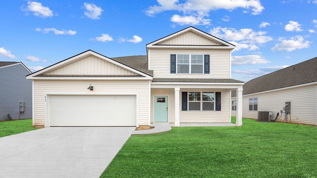 Front exterior of a new home in The Retreat at East Argent, Ridgeland, SC, highlighting curb appeal (Image 1).