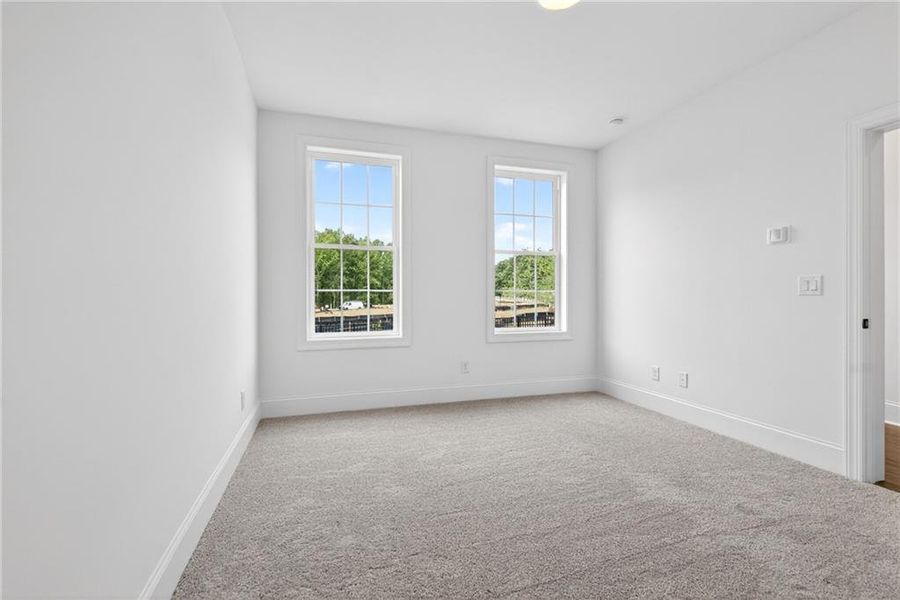 Spacious, unfurnished interior of a new home in Waterhaven, Cumming (Image 18).