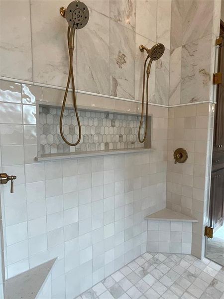 Bathroom with a tile shower