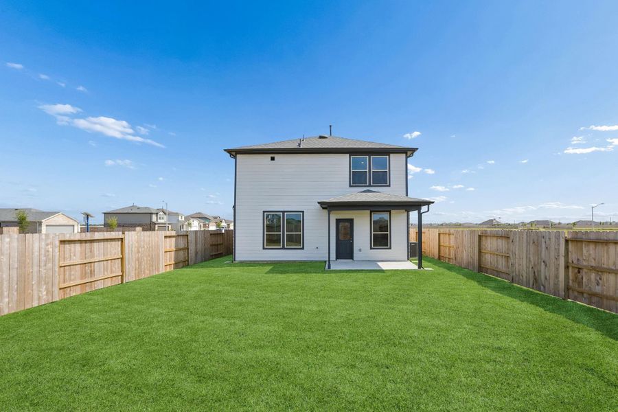 Exterior details and patio area of a home in River Ranch, Dayton (Image 3).