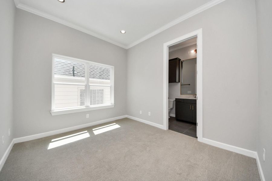 Additional bedroom with standard layout and natural lighting. Additional bedroom with standard layout and natural lighting.